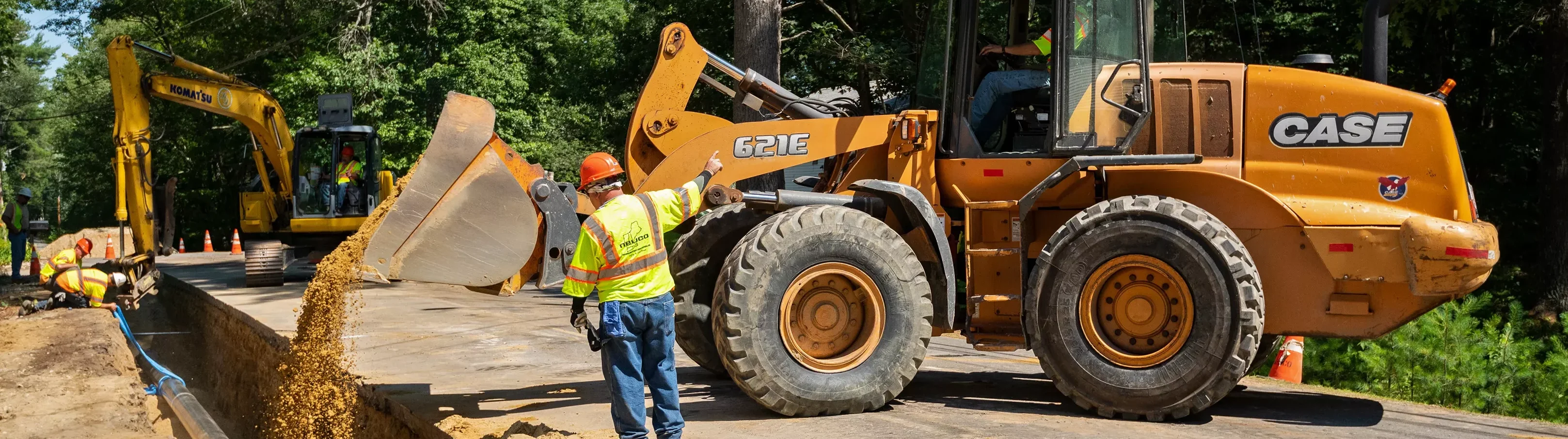 Dumping dirt with large machinery